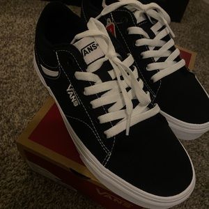 Black/White Vans. Size 7